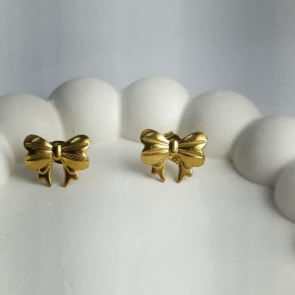 Charming Gold Bow Stud Earrings – Delicate Ribbon Design - Image 2