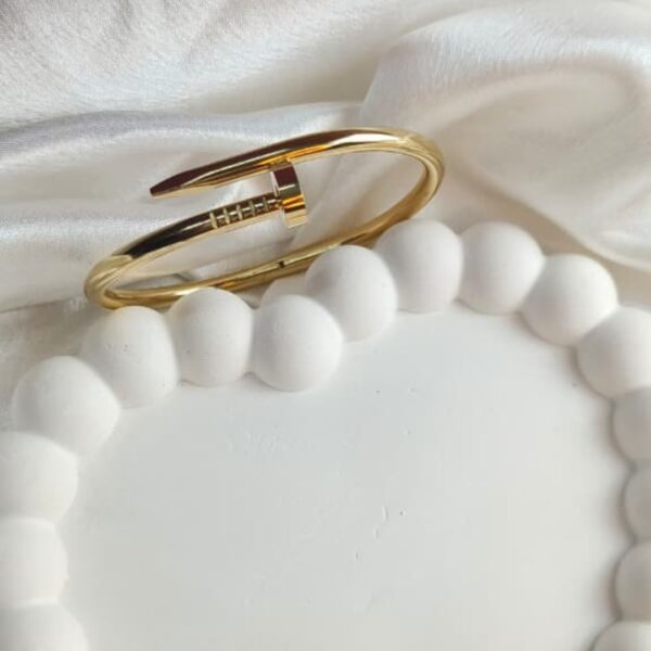 Golden Sleek Nail Bangle – Modern Minimalist Statement Jewelry - Image 3