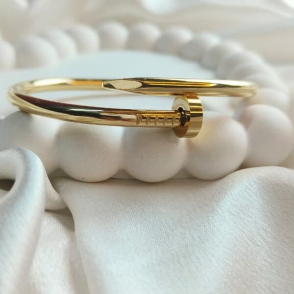 Golden Sleek Nail Bangle – Modern Minimalist Statement Jewelry